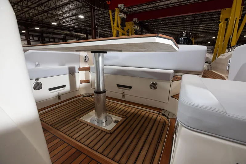 Slide: The Image of Interior of 2025 Nuova Jolly Prince 38 Sport Cabin with wooden flooring and seating area. - 25