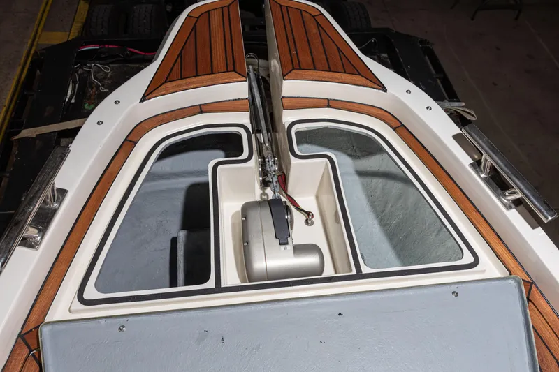 Slide: The Image of 2025 Nuova Jolly Prince 38 Sport Cabin deck with wood accents and modern design. - 9