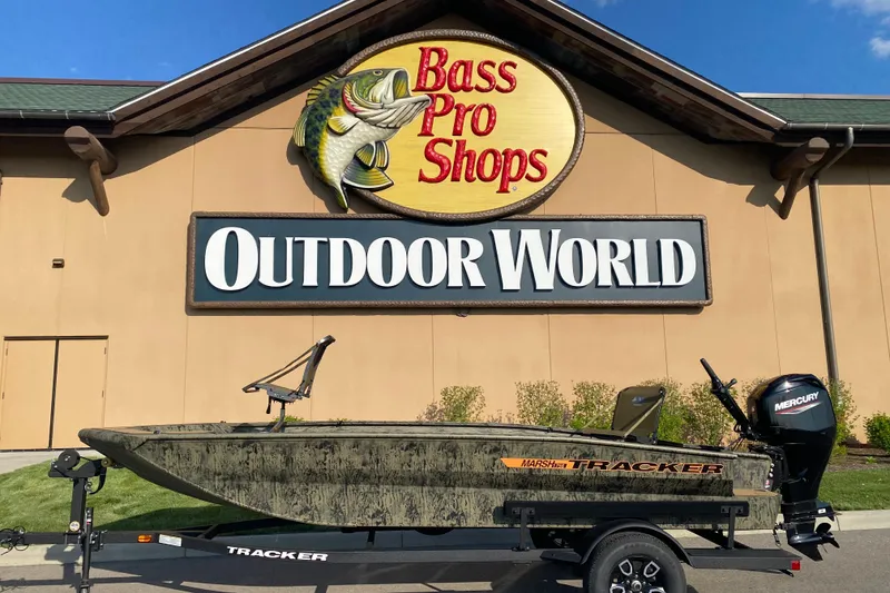 The Image of 2026 Tracker Grizzly 1756 T Marsh boat outside Bass Pro Shops Outdoor World. - 0