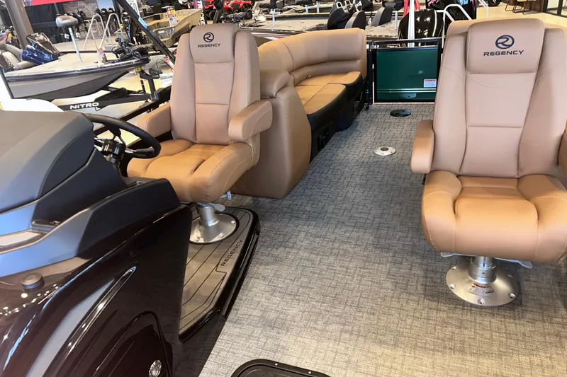 Slide: The Image of Luxurious interior of 2026 Regency 230 DL boat with plush seating. - 22
