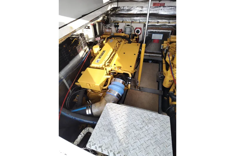Slide: The Image of Engine room of 1998 Luhrs 36 SX Open boat with Caterpillar engine components. - 15