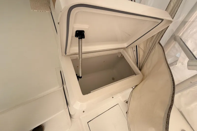 Slide: The Image of Open storage compartment on 1998 Luhrs 36 SX Open boat deck. - 22