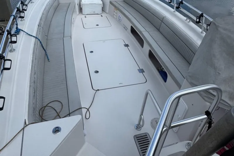 Slide: The Image of Spacious deck of 2021 OceanPro 35 CWS boat with seating and storage. - 4