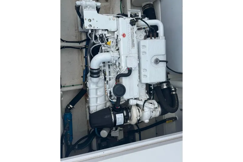 Slide: The Image of Engine of 2021 OceanPro 35 CWS boat, showcasing intricate mechanical components. - 6