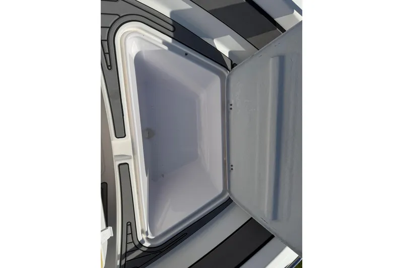 Slide: The Image of Open storage compartment on a 2007 Pro-Line 20 Sport boat. - 15