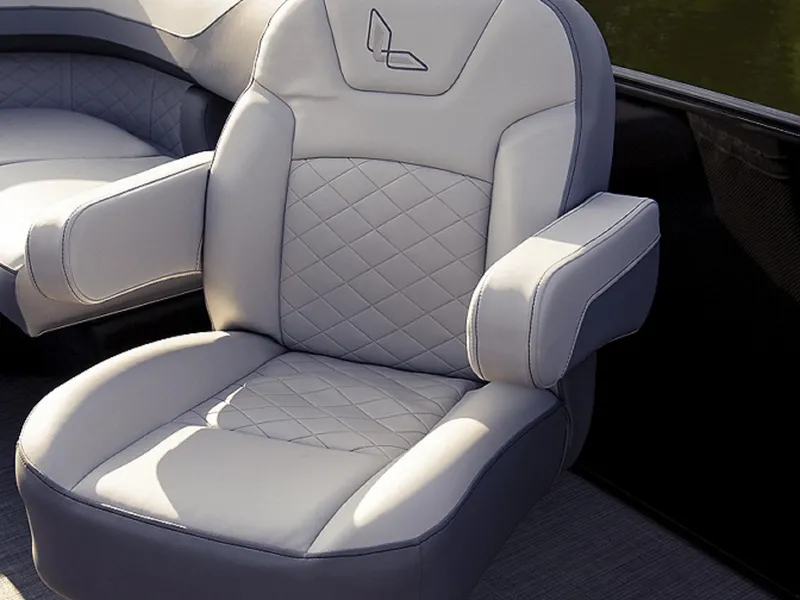 Slide: The Image of Luxurious seating on 2025 Lowe SS230WV boat with quilted design and armrests. - 7