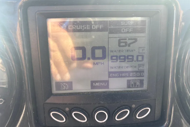 Slide: The Image of Dashboard display of a 2016 Moomba Craz boat showing speed, water temperature, and engine hours. - 12