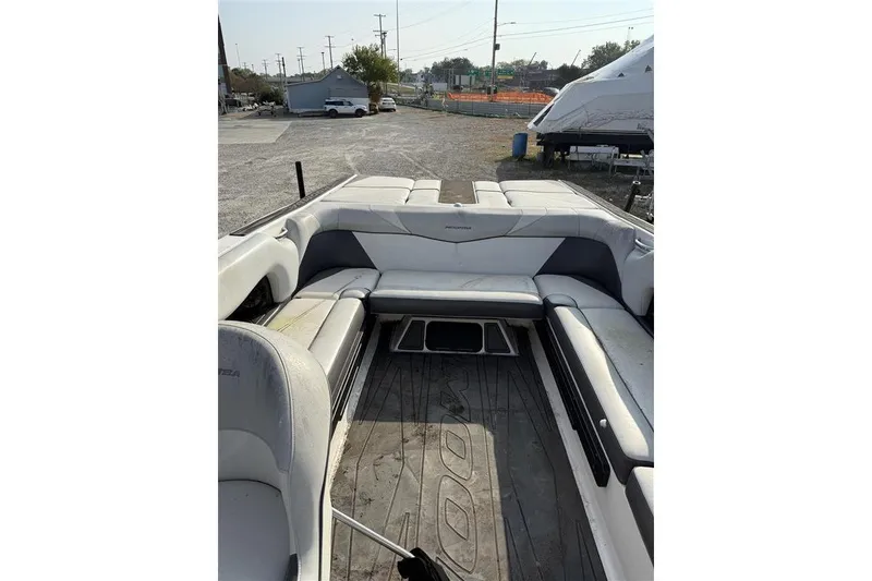 Slide: The Image of 2016 Moomba Craz boat interior with spacious seating and clean design. - 7