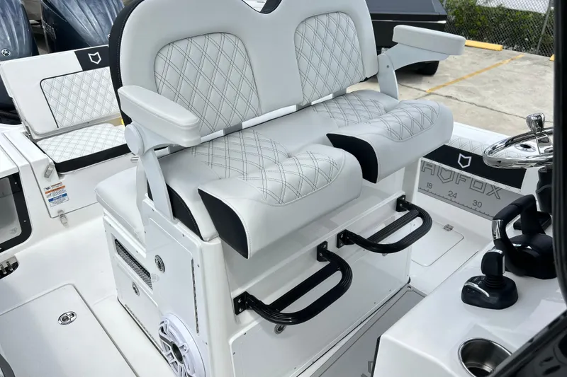 Slide: The Image of Luxurious seating on 2026 Sea Fox 282 Hybrid LT boat with diamond-stitched upholstery. - 10