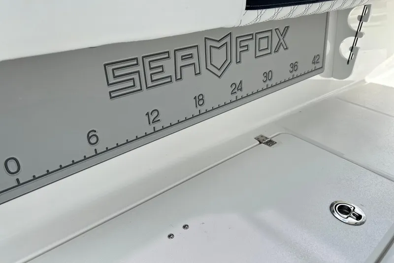 Slide: The Image of 2026 Sea Fox 282 Hybrid LT boat deck with integrated measuring scale. - 11