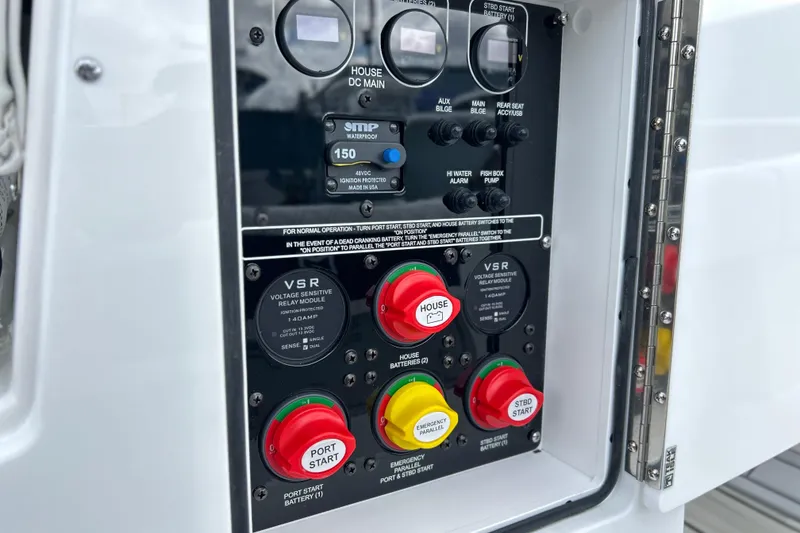 Slide: The Image of Control panel of a 2026 Sea Fox 282 Hybrid LT boat with labeled switches and indicators. - 21