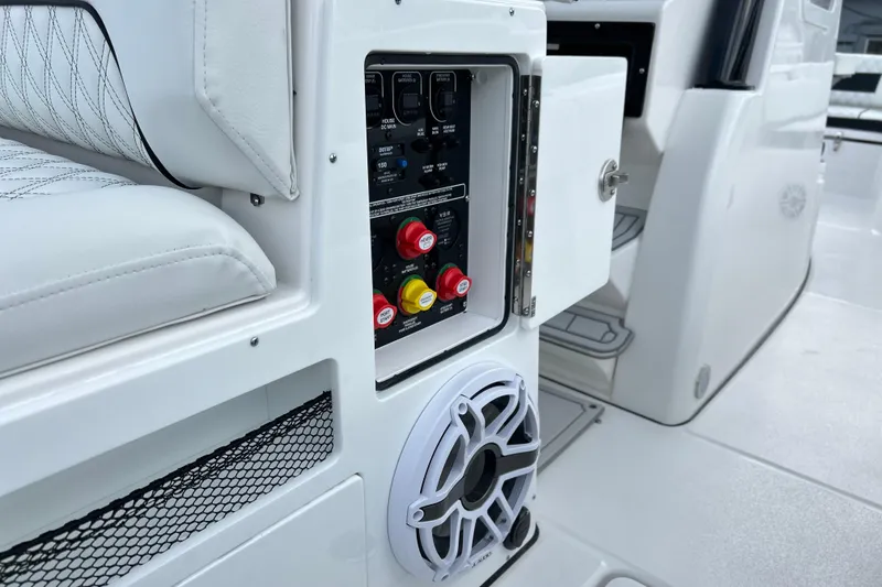 Slide: The Image of 2026 Sea Fox 282 Hybrid LT boat interior with control panel and speaker. - 22