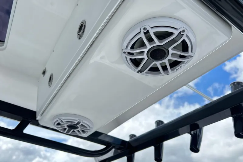 Slide: The Image of 2026 Sea Fox 282 Hybrid LT boat speakers against a cloudy sky backdrop. - 24