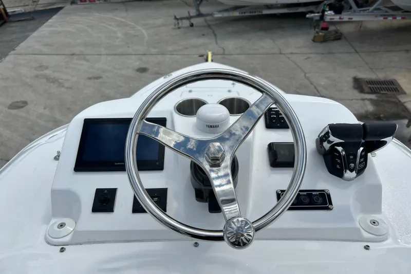Slide: The Image of Steering console of 2026 Sea Fox 282 Hybrid LT boat with Yamaha controls. - 26