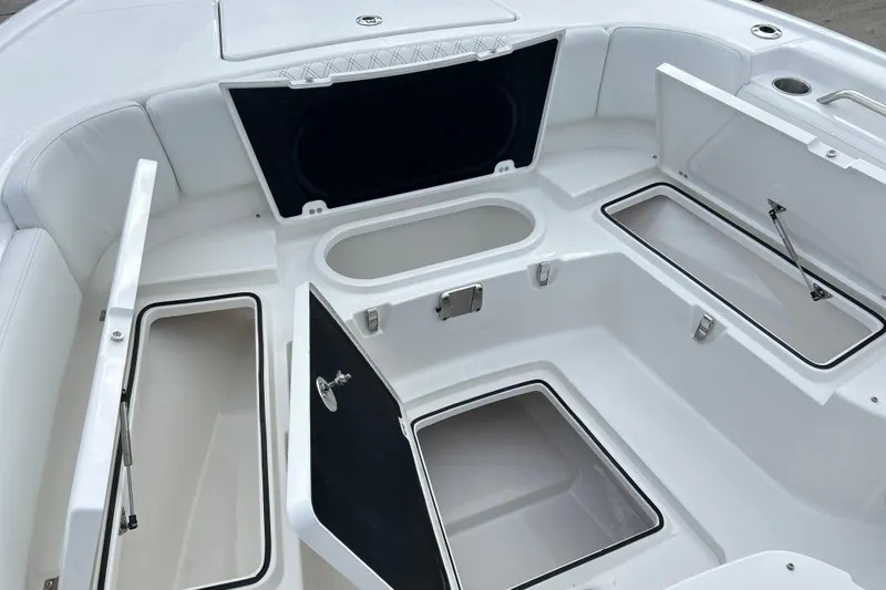 Slide: The Image of Open storage compartments on a 2026 Sea Fox 282 Hybrid LT boat deck. - 34