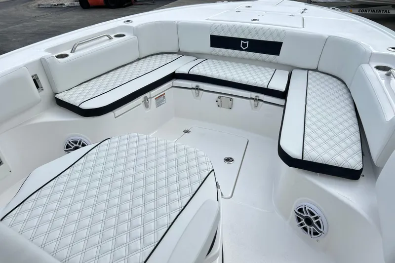 Slide: The Image of Luxurious seating area on 2026 Sea Fox 282 Hybrid LT boat with diamond-stitched upholstery. - 4