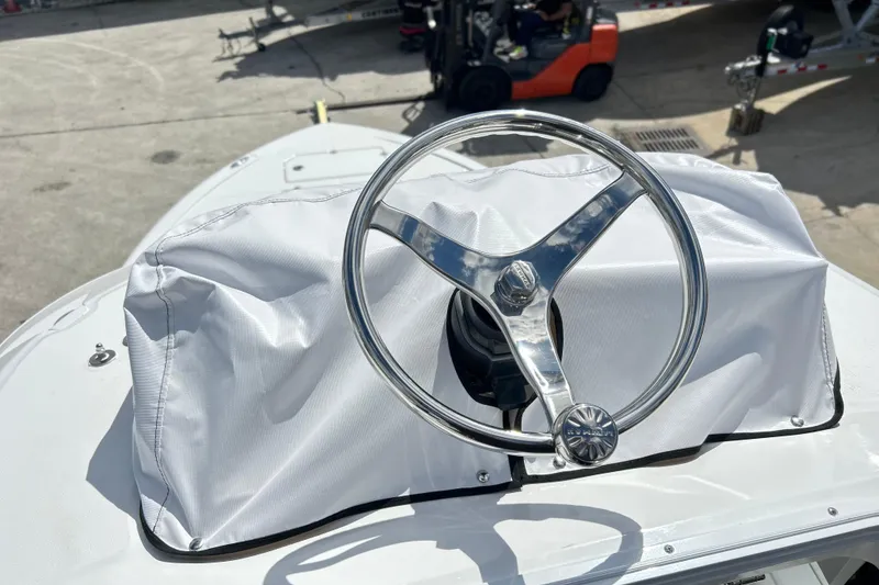 Slide: The Image of Steering wheel of 2026 Sea Fox 282 Hybrid LT boat, covered in protective fabric. - 41