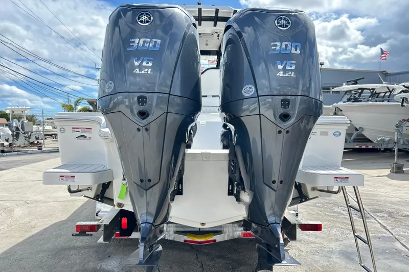 Slide: The Image of Twin Yamaha 300 V6 engines on a 2026 Sea Fox 282 Hybrid LT boat. - 43