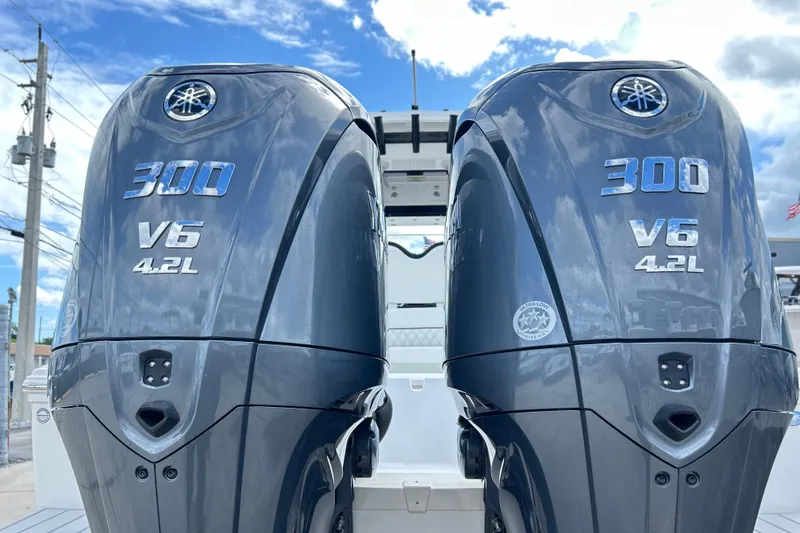 Slide: The Image of Twin Yamaha 300 V6 4.2L outboard engines on a 2026 Sea Fox 282 Hybrid LT boat. - 45