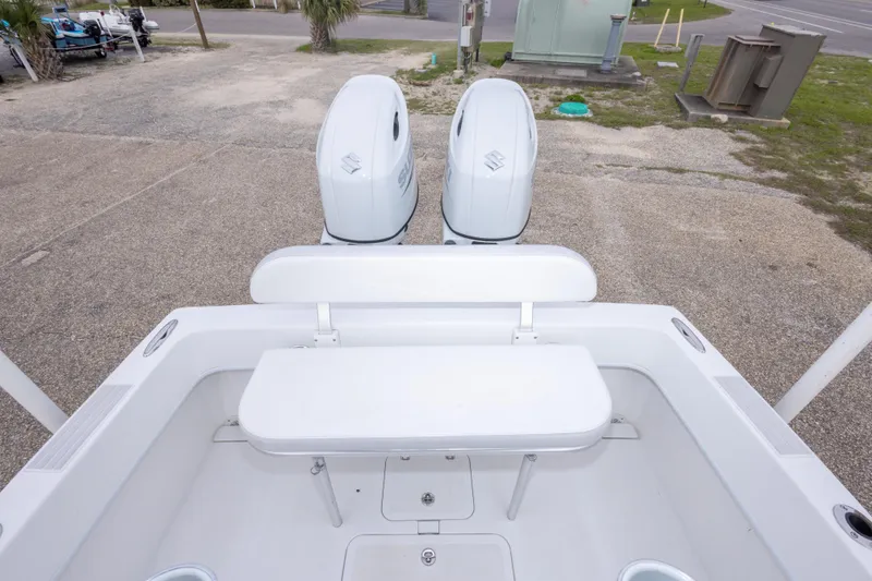 Slide: The Image of 2023 Dusky 252 Open Fisherman boat with dual Suzuki outboard engines. - 31