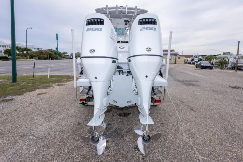 Slide: The Image of 2023 Dusky 252 Open Fisherman with twin 200 horsepower outboard engines. - 6