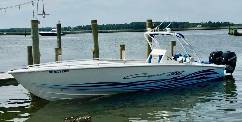 Slide: The Image of 2007 Concept 36 boat docked with blue design. - 3