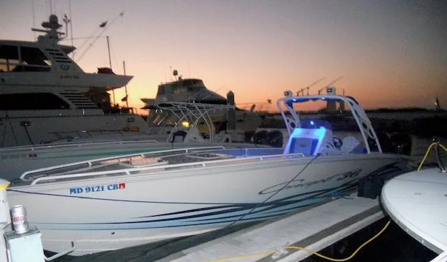 Slide: The Image of 2007 Concept 36 boat docked at sunset in harbor. - 5