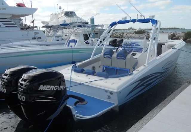 Slide: The Image of 2007 Concept 36 boat with Mercury engines docked at marina. - 7