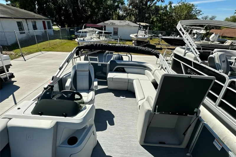 Slide: The Image of 2026 Sweetwater SW2086CPSE pontoon boat with spacious seating and modern design. - 11