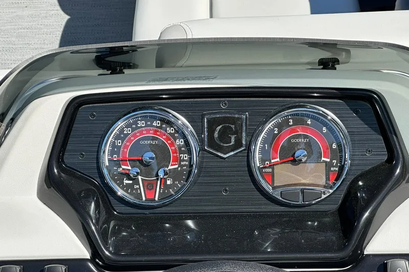 Slide: The Image of Dashboard of a 2026 Sweetwater SW2086CPSE boat with Godfrey gauges. - 15