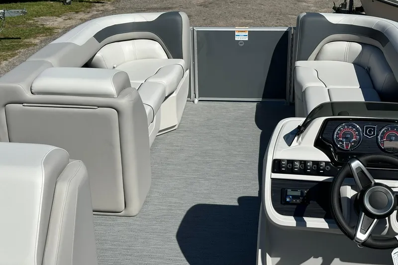 Slide: The Image of 2026 Sweetwater SW2086CPSE pontoon boat interior with plush seating and modern dashboard. - 27