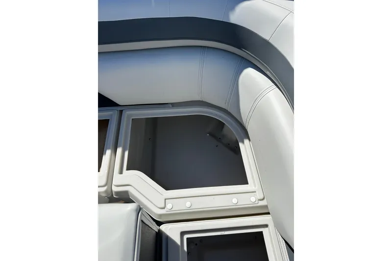 Slide: The Image of Interior view of Sweetwater SW2086CPSE boat, showcasing storage compartments, 2026 model. - 34