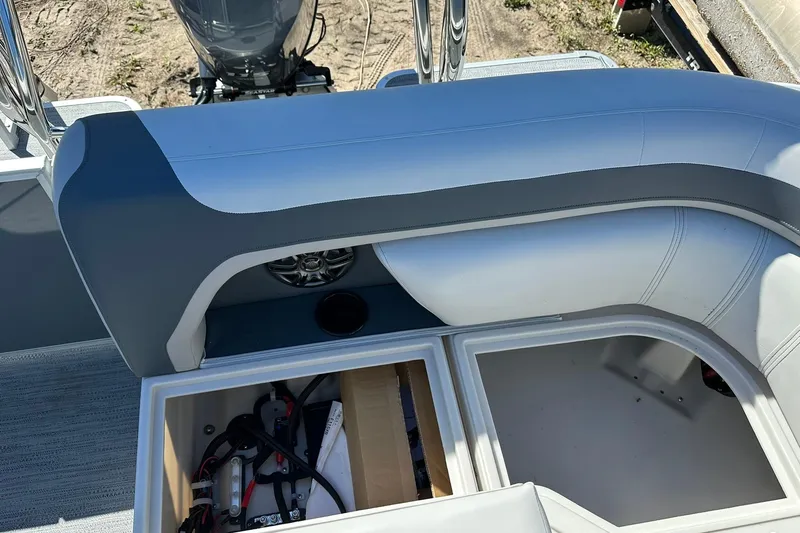 Slide: The Image of 2026 Sweetwater SW2086CPSE boat interior with storage compartment and seating. - 36