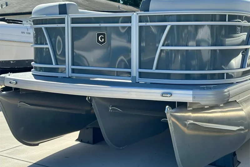 Slide: The Image of 2026 Sweetwater SW2086CPSE pontoon boat with sleek aluminum design. - 4