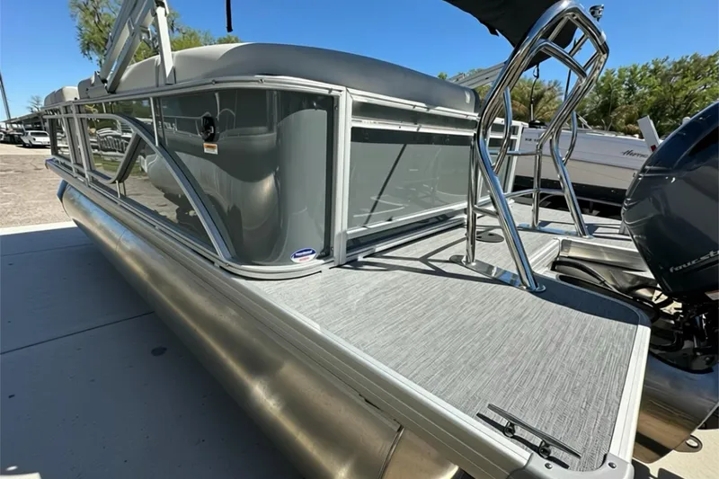 Slide: The Image of 2026 Sweetwater SW2086CPSE pontoon boat with sleek design and sturdy railing. - 44