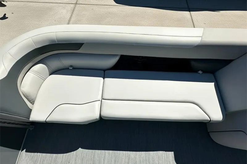 Slide: The Image of Luxurious seating on 2026 Sweetwater SW2086CPSE boat, featuring sleek white upholstery. - 7