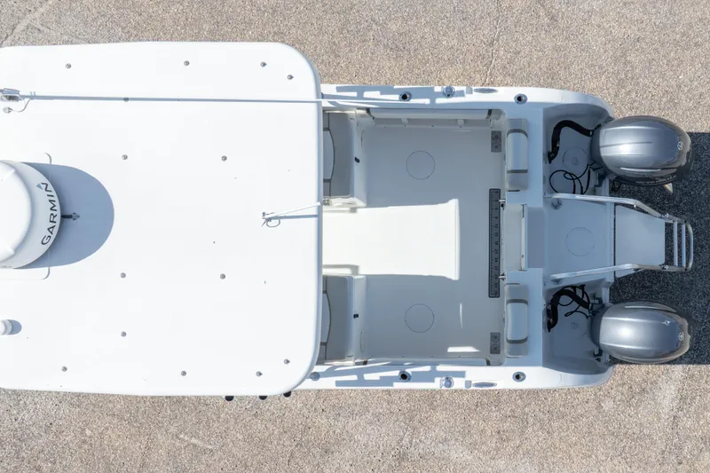 Slide: The Image of Aerial view of 2016 World Cat 255 DC boat with dual engines. - 5