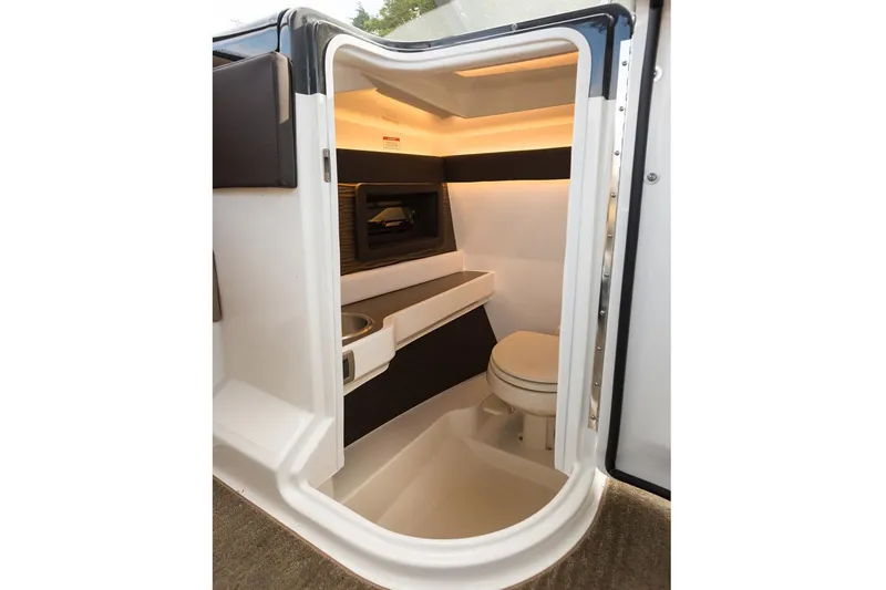 Slide: The Image of Manufacturer Provided Image: 2018 Sea Ray SLX 280 boat interior bathroom with modern amenities. - 10