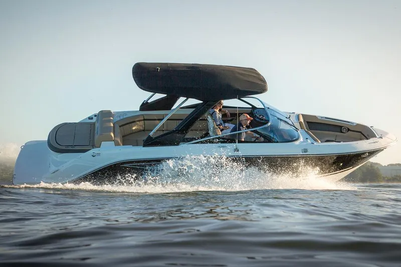 Slide: The Image of Manufacturer Provided Image: 2018 Sea Ray SLX 280 boat cruising on water. - 2