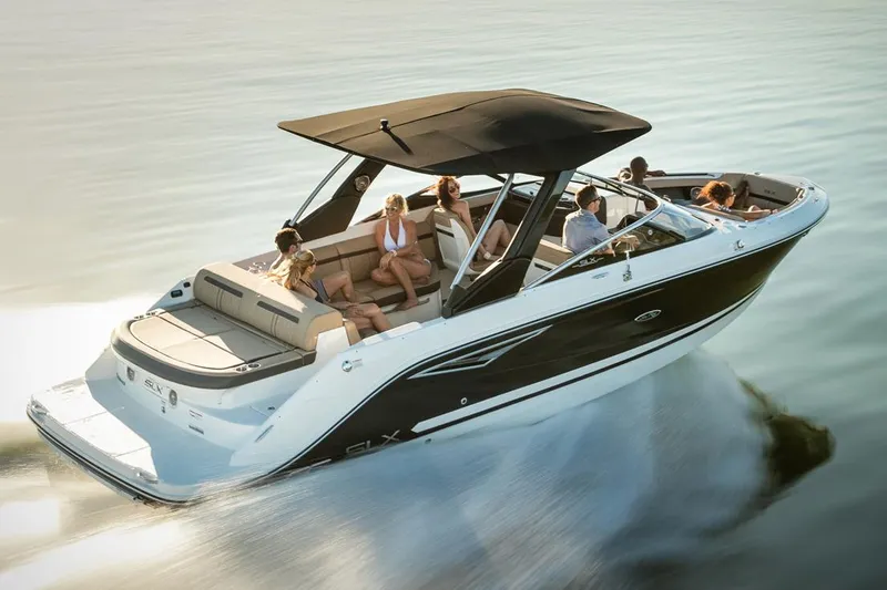 Slide: The Image of Manufacturer Provided Image: 2018 Sea Ray SLX 280 boat cruising with passengers on a sunny day. - 3