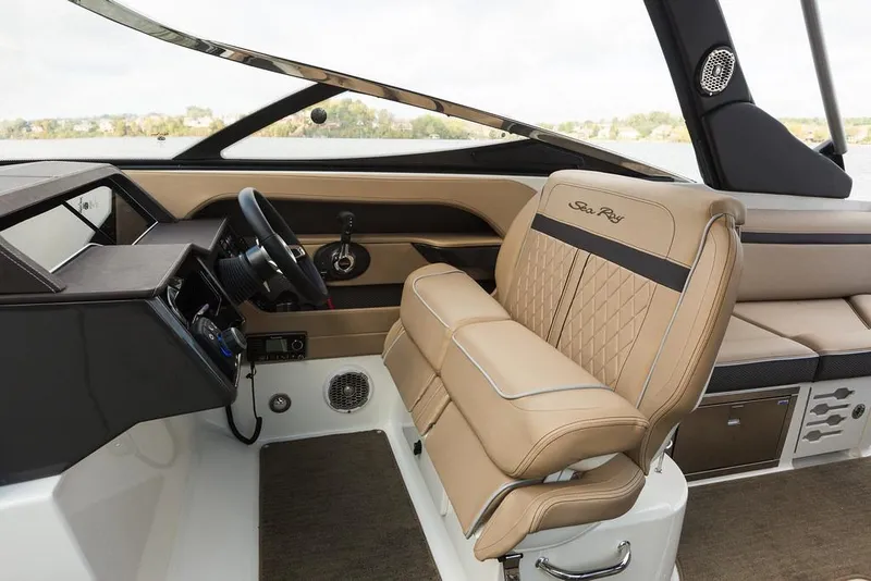 Slide: The Image of Manufacturer Provided Image: 2018 Sea Ray SLX 280 boat interior with tan leather seats and modern dashboard. - 6