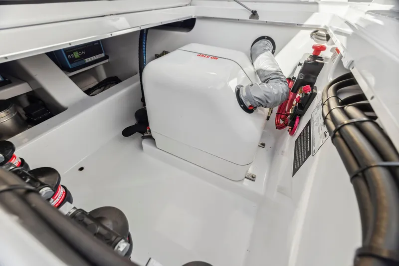 Slide: The Image of Engine compartment of 2022 Cigarette 42 Auroris boat, showcasing clean design and components. - 28