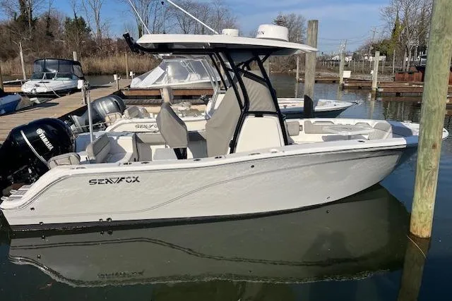 The Image of 2021 Sea Fox 228 Commander boat docked in a marina. - 0