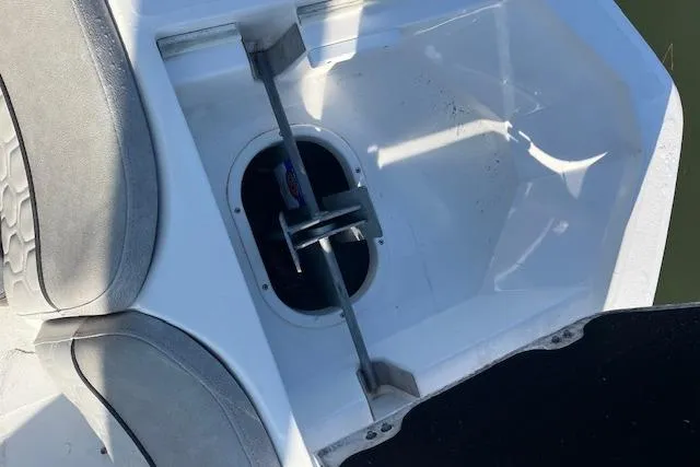 Slide: The Image of 2021 Sea Fox 228 Commander boat interior detail with seating and storage compartment. - 12