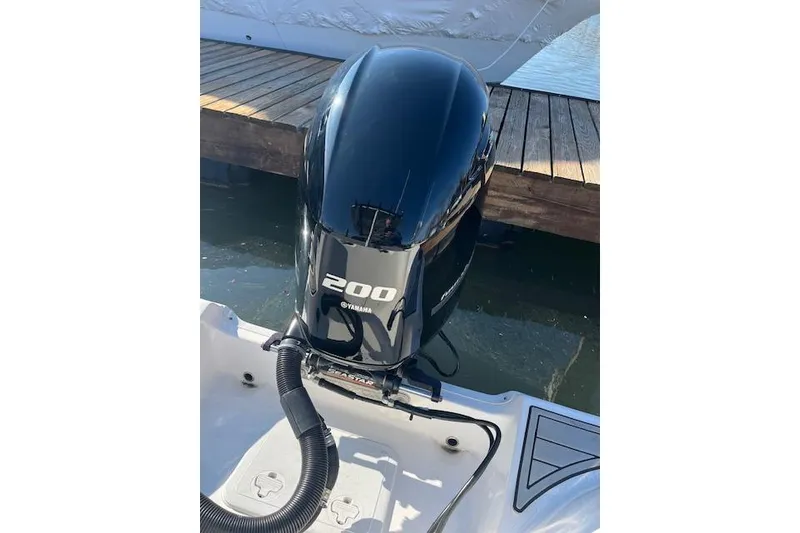 Slide: The Image of 2021 Sea Fox 228 Commander with Yamaha 200 outboard motor at dock. - 16