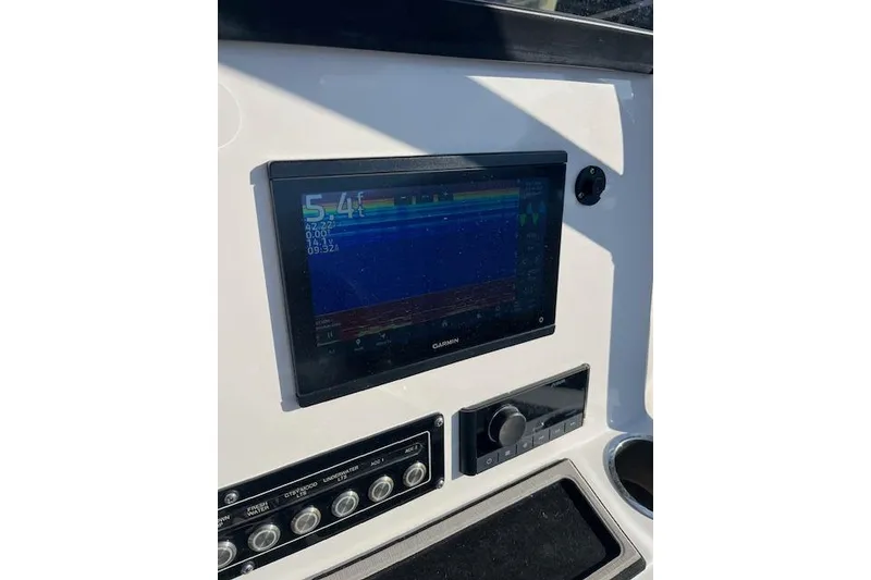 Slide: The Image of Console of 2021 Sea Fox 228 Commander with Garmin display and controls. - 20