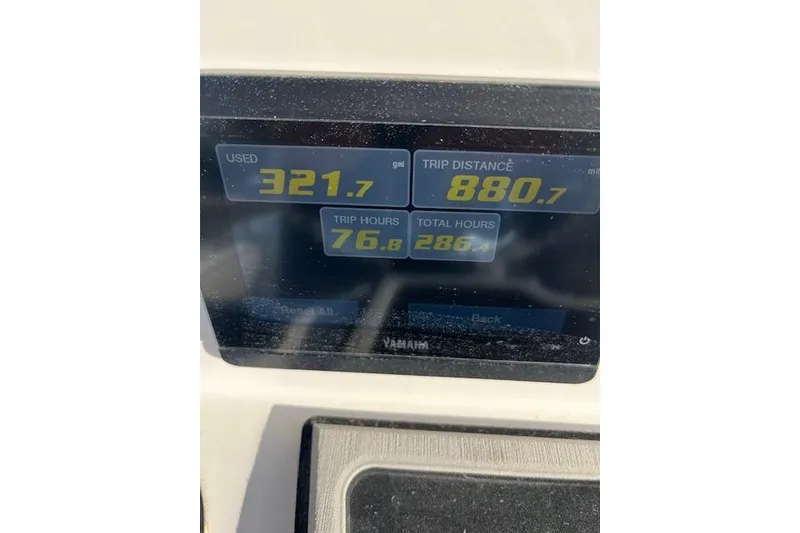 Slide: The Image of Dashboard display of a 2021 Sea Fox 228 Commander showing fuel and trip data. - 22