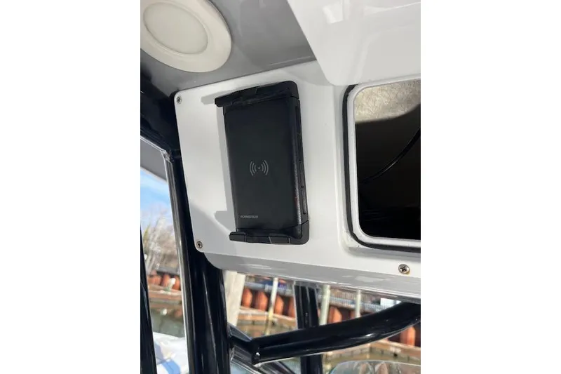 Slide: The Image of 2021 Sea Fox 228 Commander boat with mounted wireless charging pad. - 25