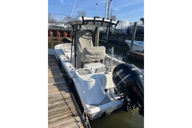 Slide: The Image of 2021 Sea Fox 228 Commander boat docked with Yamaha outboard motor. - 3