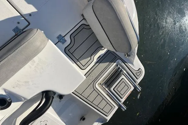 Slide: The Image of 2021 Sea Fox 228 Commander boat deck with seating and ladder. - 30